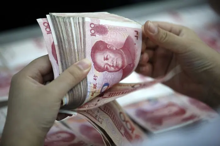 Рекорден спад на китайските валутни резерви