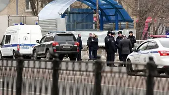 Жена с отрязана глава в ръка крещи в Москва 