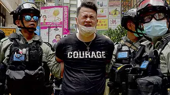 Поне 180 арестувани в Хонконг (СНИМКИ)