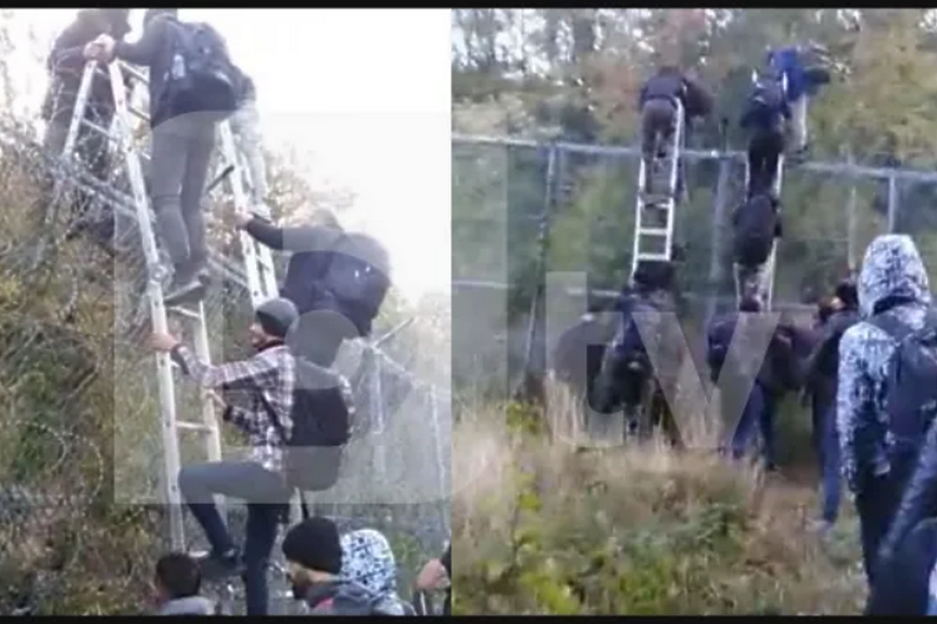 Вижте как мигранти прескачат със стълби 
